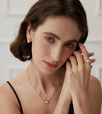 Model wearing Vintage Mother-of-Pearl Oval Stud Earrings with Mother-of-Pearl Necklace & Ring, 18K Gold-Plated S925 Silver, Gold Color
