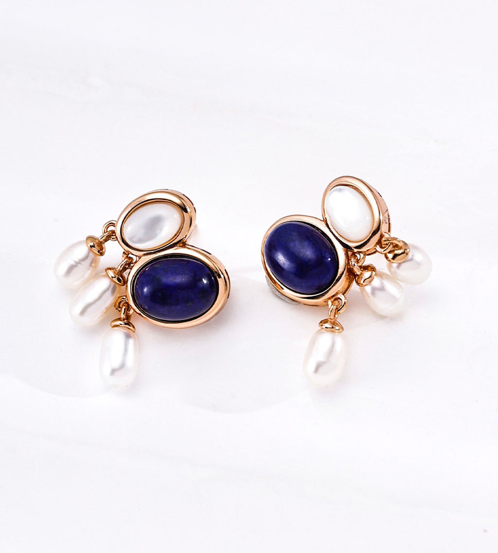 A pair of 18K gold-plated on S925 silver drop earrings featuring oval-shaped lapis lazuli and mother-of-pearl, with dangling white natural freshwater pearls