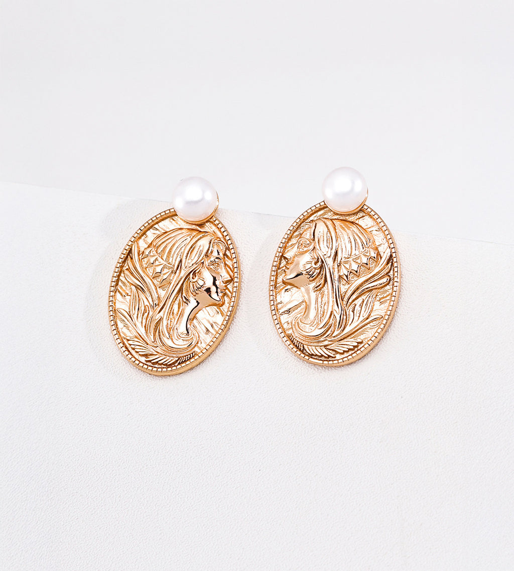 Vintage Gold pearl earrings with embossed oval lady portrait medallions, flowing hair details and finely textured borders.
