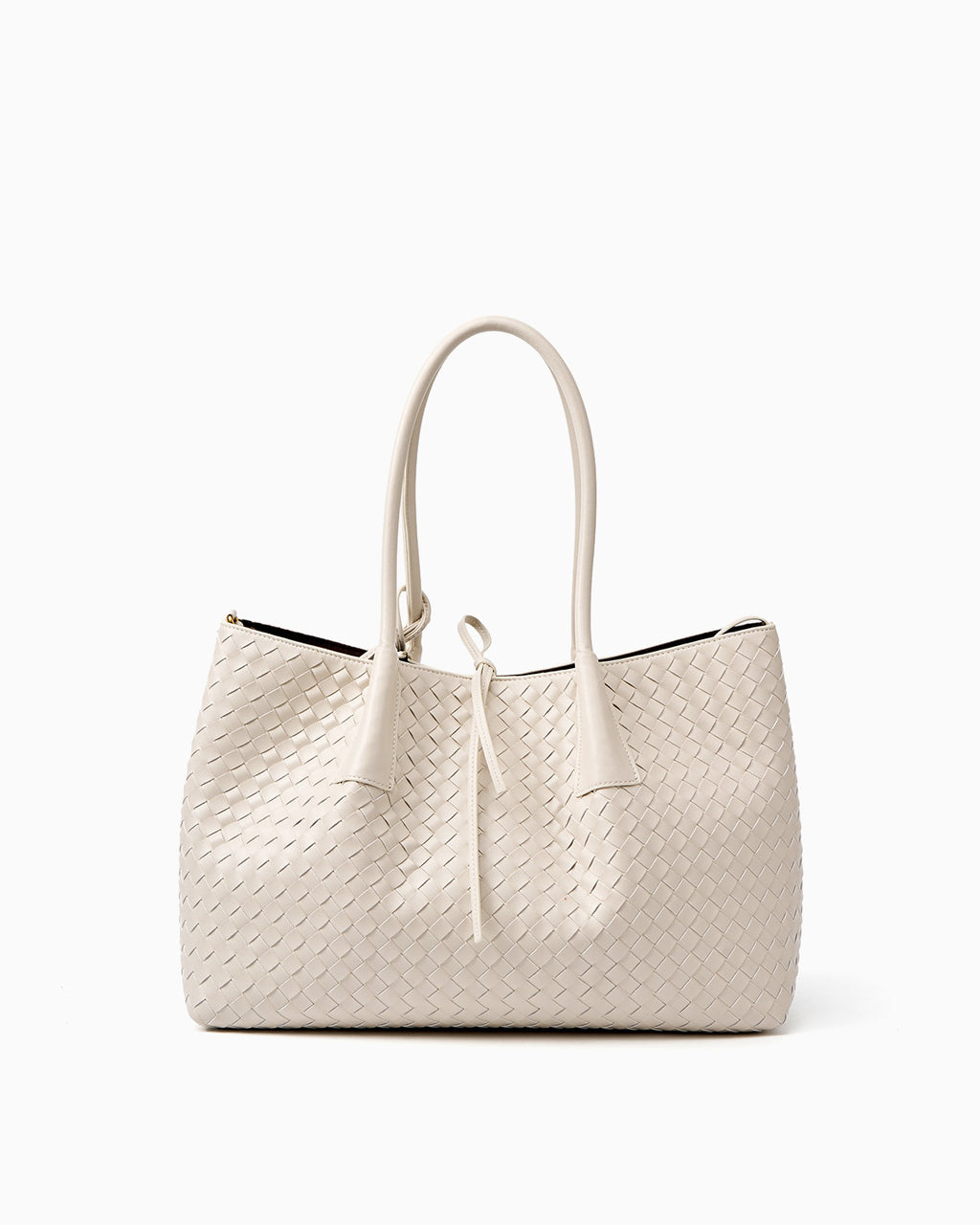 A white woven leather large tote bag with double top handles and a drawstring detail