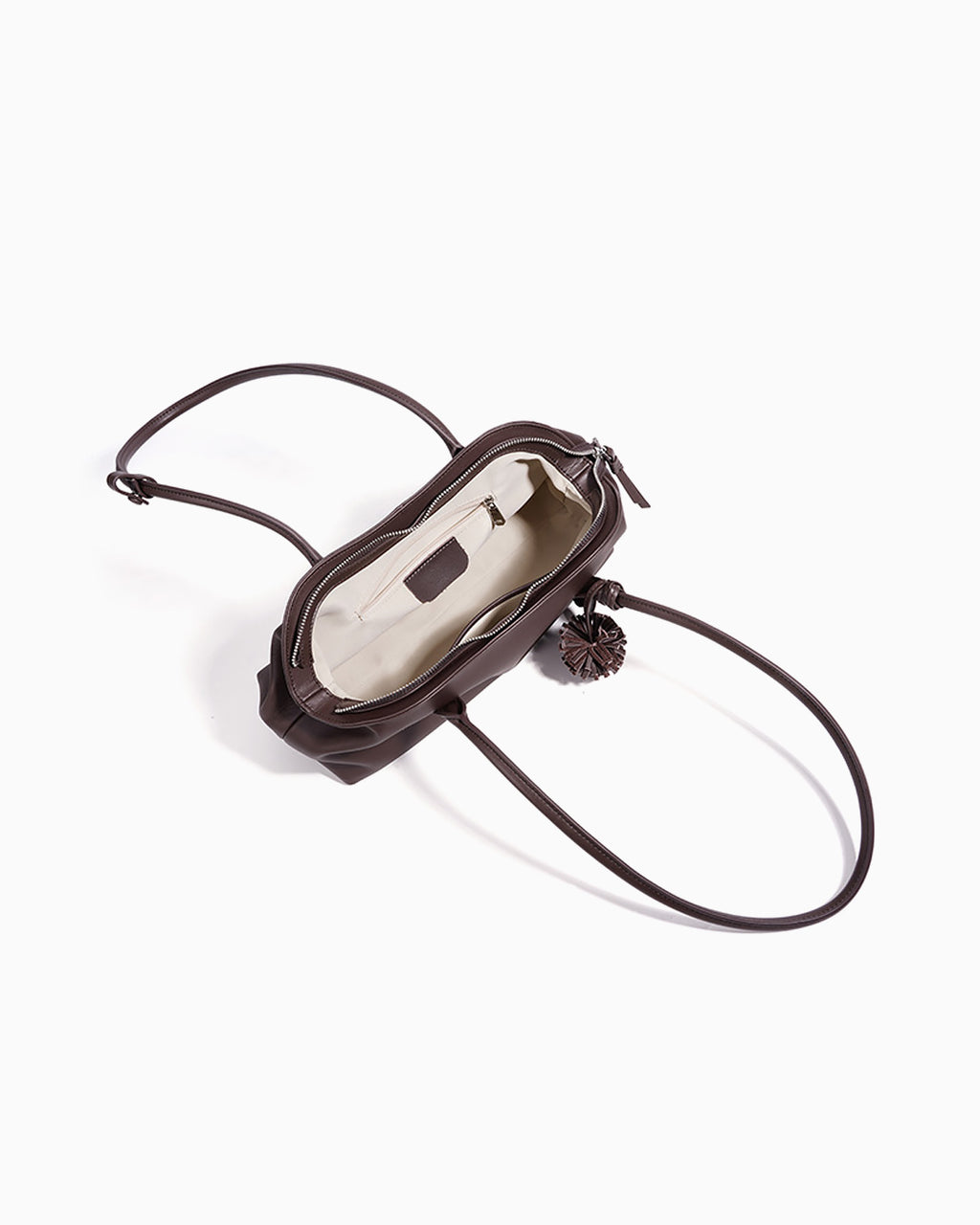 Compartment details of the coffee-colored Genuine Leather Shoulder Bag with Zip Closure & Leather Tassel