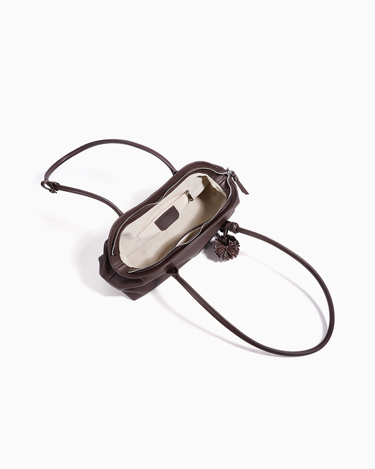 Compartment details of the coffee-colored Genuine Leather Shoulder Bag with Zip Closure & Leather Tassel