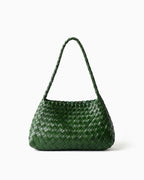 A dark green woven leather shoulder bag with a single braided strap