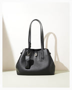 Women's Elegant Genuine Leather Black Tote Bucket Bag with Spacious Interior and Detachable Leather Lipstick Pouch