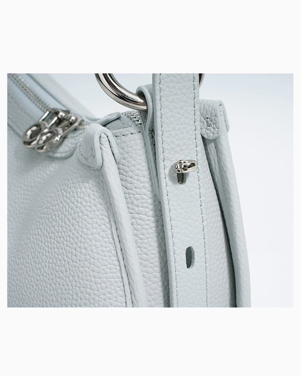 Hardware details and stitching of the Genuine Leather Crescent Shoulder Bag with Adjustable Strap