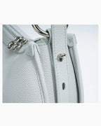 Hardware details and stitching of the Genuine Leather Crescent Shoulder Bag with Adjustable Strap