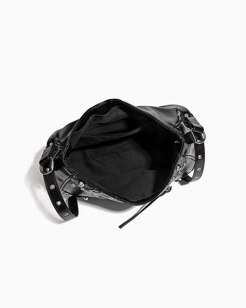 Compartment details of the Black Studded Y2K Statement Vegan Leather Handbag with an adjustable single strap