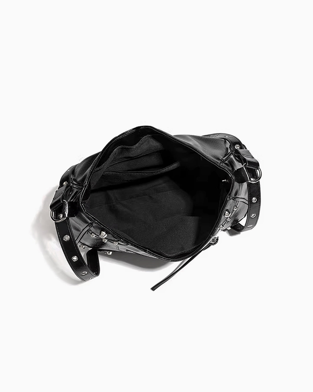 Compartment details of the Black Studded Y2K Statement Vegan Leather Handbag with an adjustable single strap