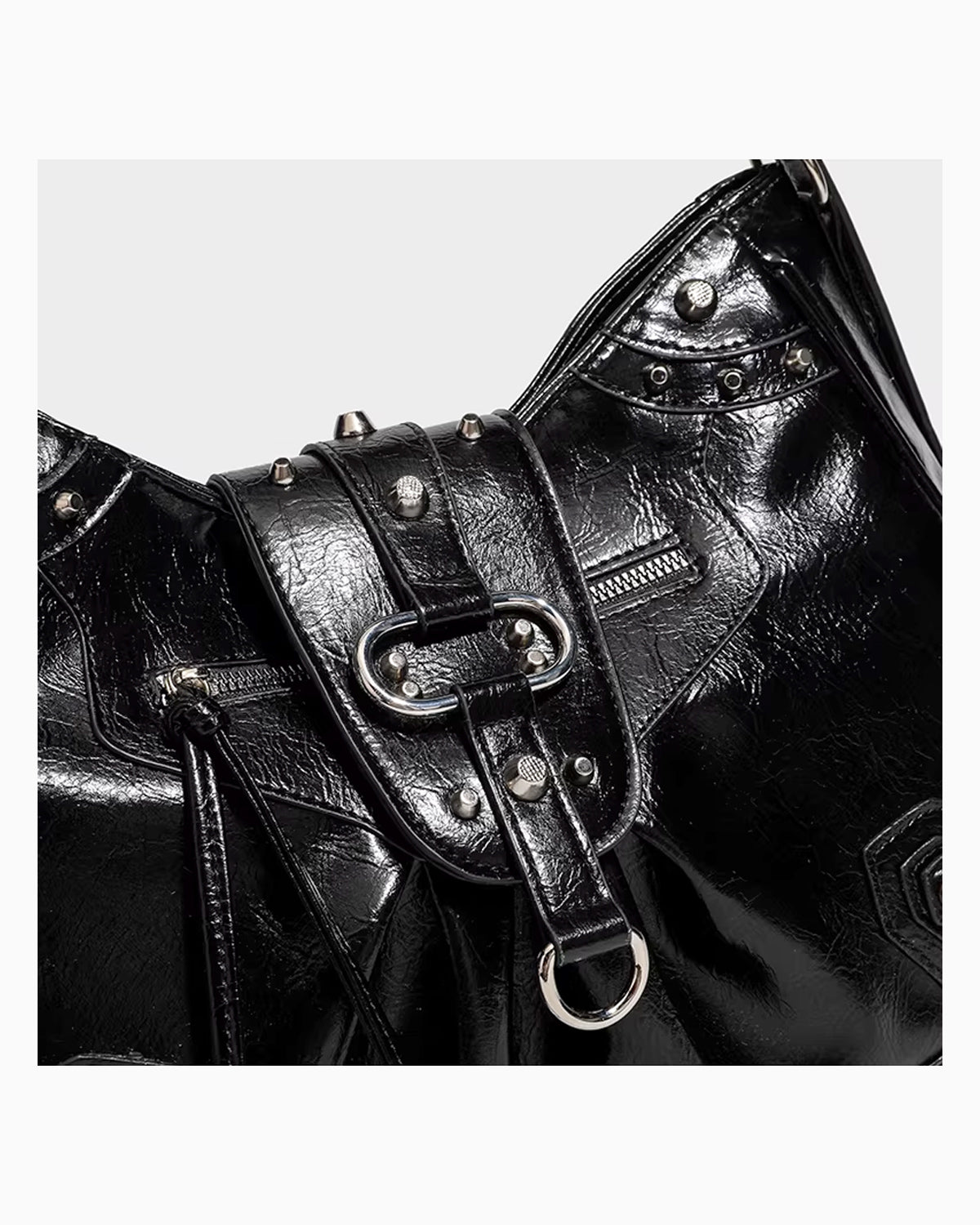 Leather texture and hardware details Black Studded Y2K Statement Vegan Leather Handbag with adjustable single strap