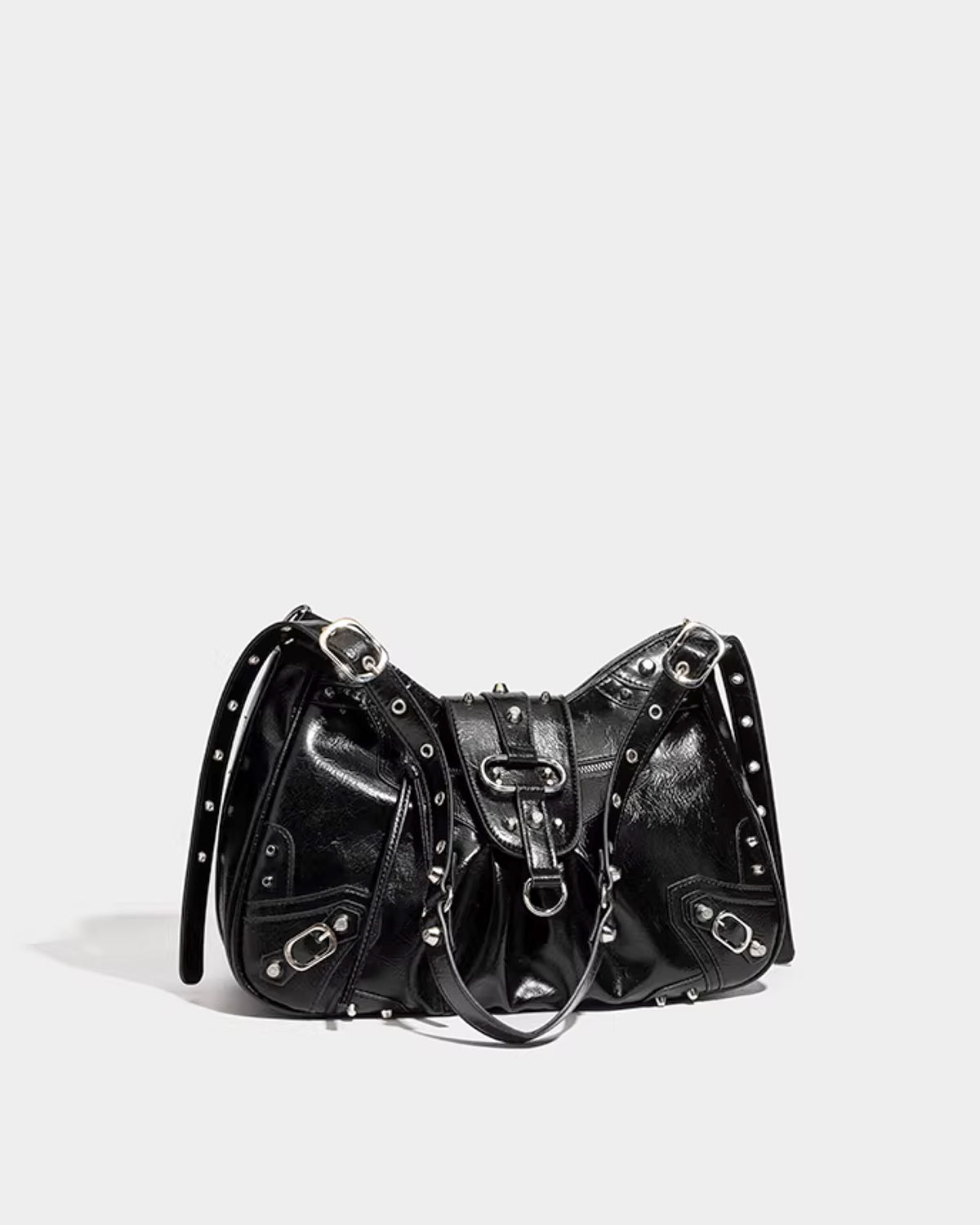 Side view of the Black Studded Y2K Statement Vegan Leather Handbag with an adjustable single strap
