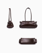 Side, back, and bottom views of Genuine Leather Shoulder Baguette Bag with zippered side pockets and turn-lock closure, Havana Color