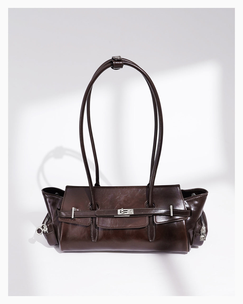 Woman's Genuine Leather Shoulder Baguette Bag with zippered side pockets and turn-lock closure, Havana Color