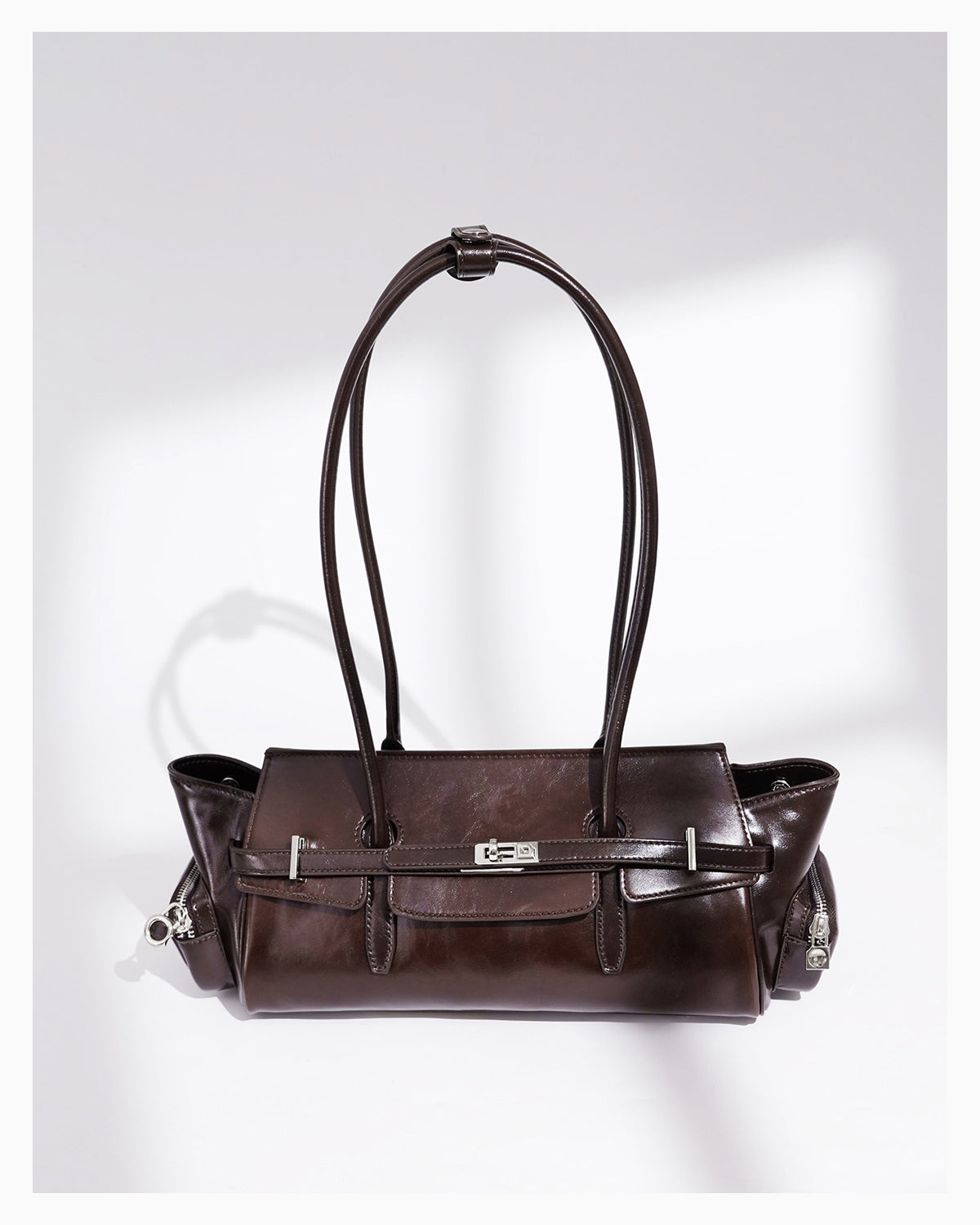 Woman's Genuine Leather Shoulder Baguette Bag with zippered side pockets and turn-lock closure, Havana Color