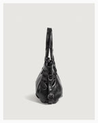 Side view of Vegan Leather Shoulder Black Bag with Spacious Interior and Adjustable Strap