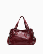 Chic Vegan Leather Shoulder Bag with Spacious Interior and Adjustable Strap, Wine Red color