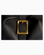 Buckle detail of the Women's Elegant Genuine Leather Shoulder Black Bag with Gold Buckle