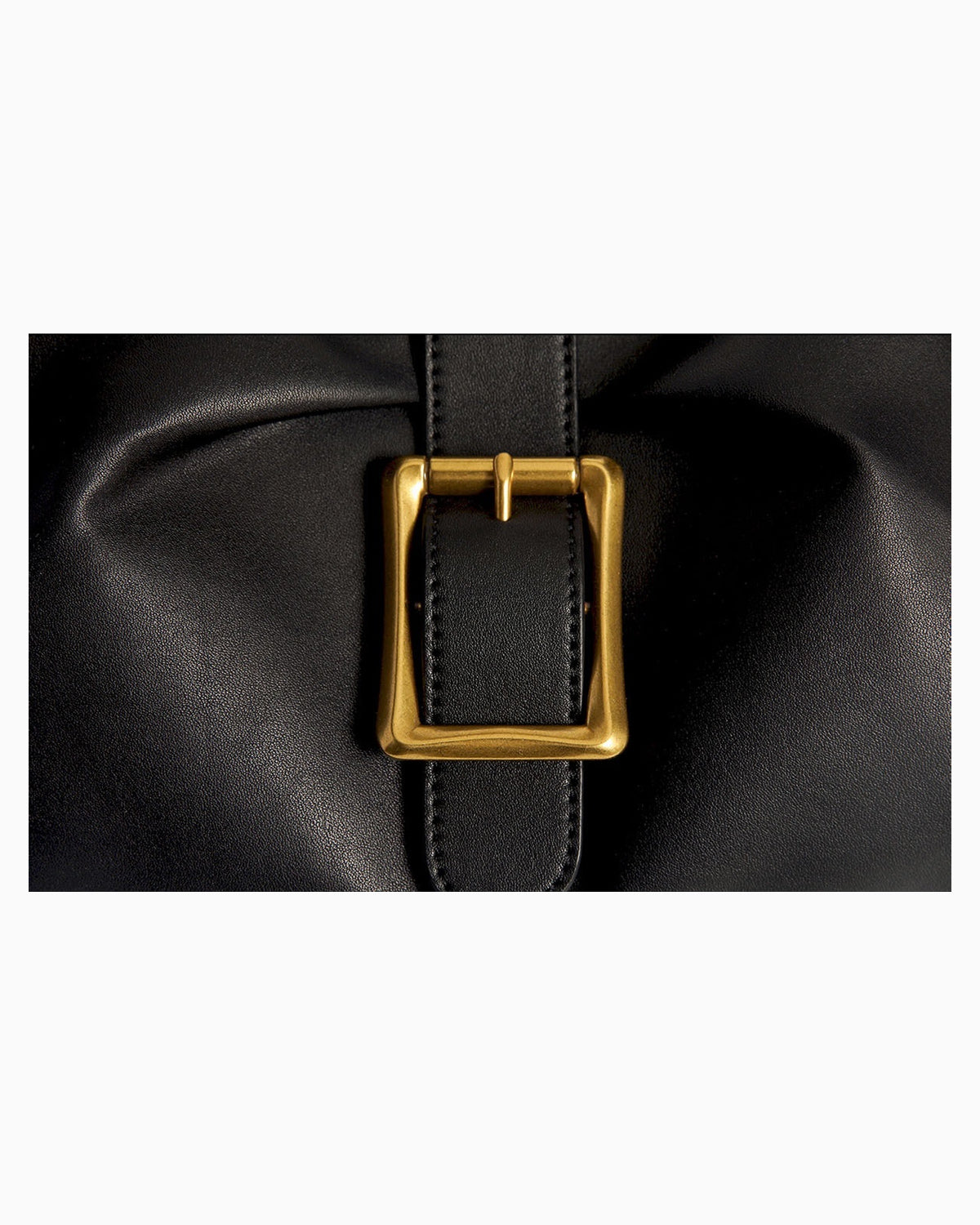 Buckle detail of the Women's Elegant Genuine Leather Shoulder Black Bag with Gold Buckle