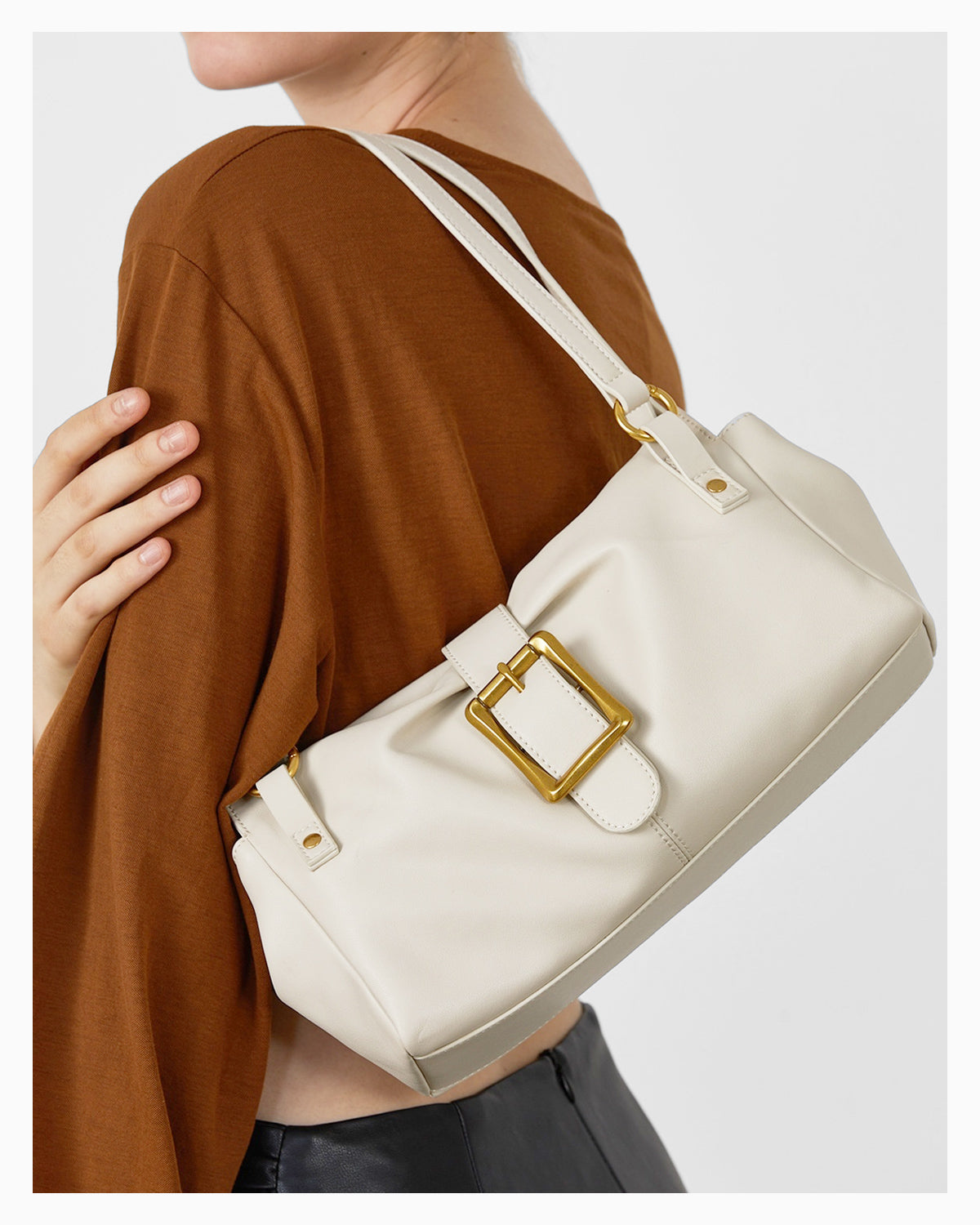 Woman wearing an Elegant Versatile Leather Shoulder White Bag with Gold Buckle