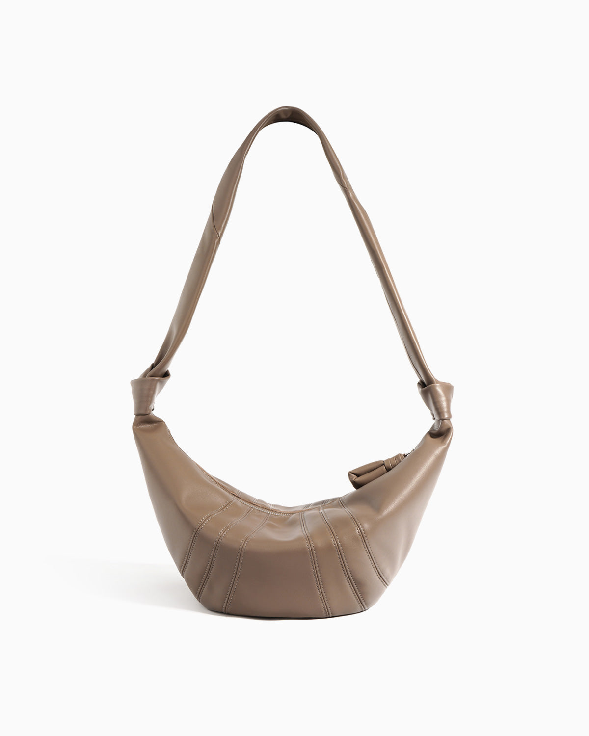 A taupe brown leather crescent-shaped shoulder bag with a single shoulder strap | BUCKLE Collective