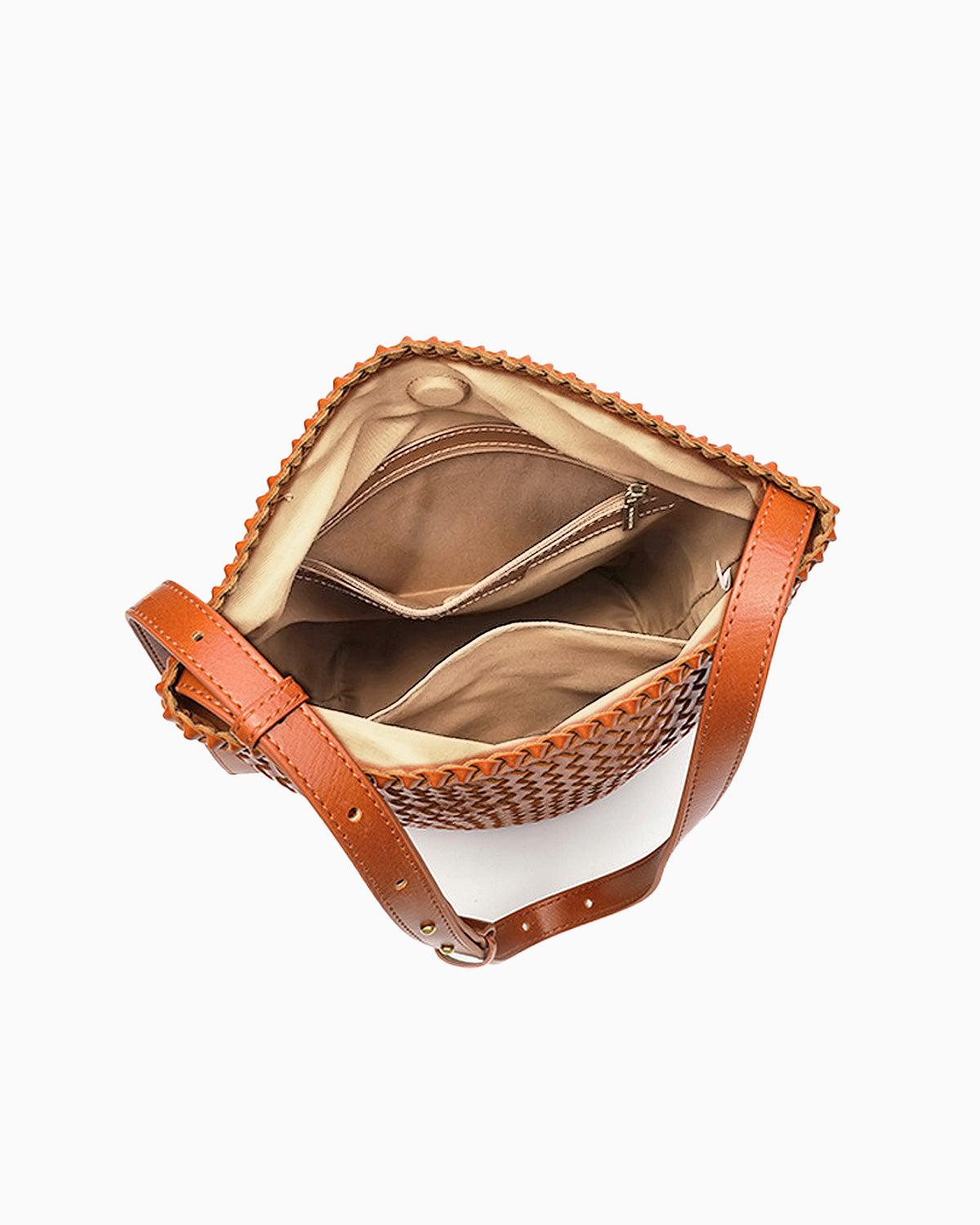 Interior details of the Woven Vegan Leather Bucket Bag with Adjustable Strap in Rich Caramel Color