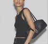 Video of Women's bags collection by BUCKLE Collective, where women in stylish outfits carry various stylish leather women's bags, showcasing those bags.